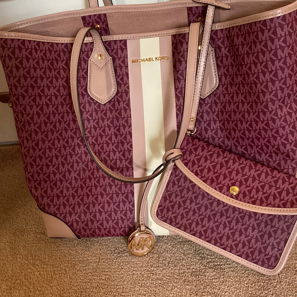Burgundy Micheal kors overnight bag